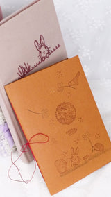 予約販売【ブック型 大き目手帳ポーチ】うさぎ刺繍入り　クロスステッチミシン刺繍 ハンドメイド